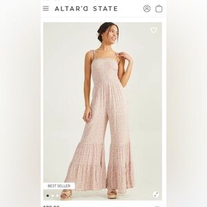 Pink floral jumpsuit with flare legs